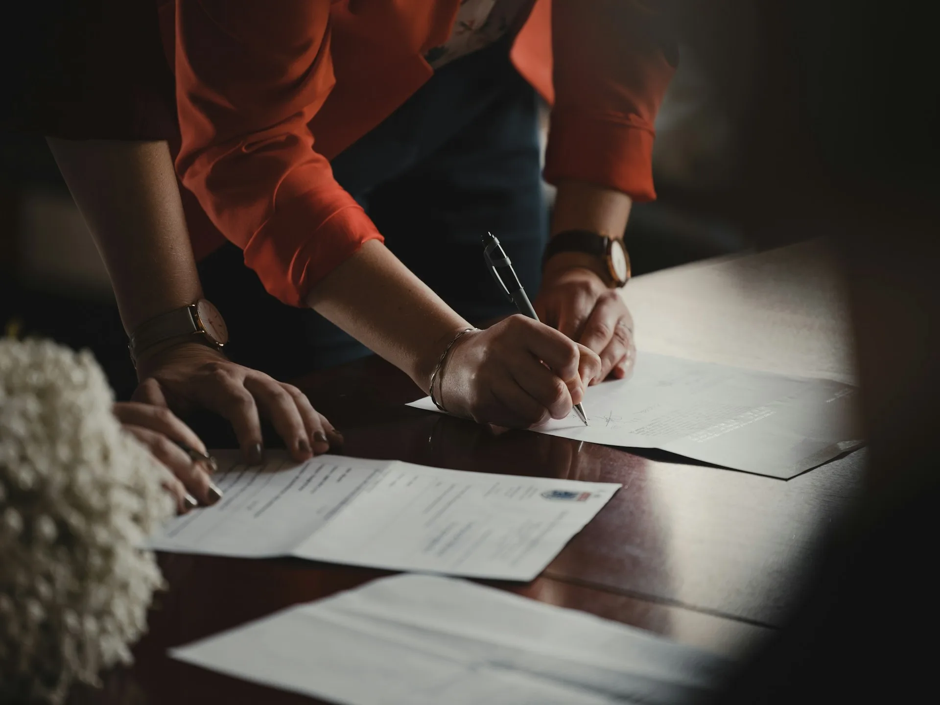 People working on a contract