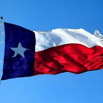 The Texas flag flying in the wind