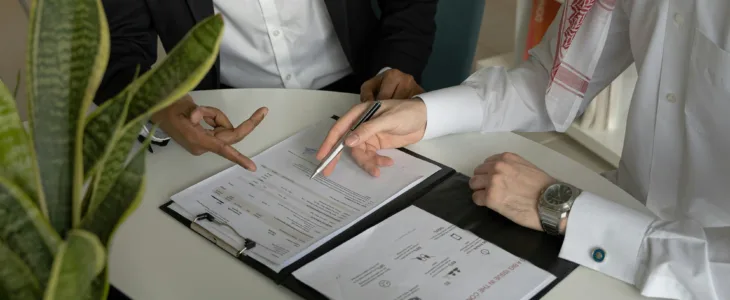 Two people going over documents