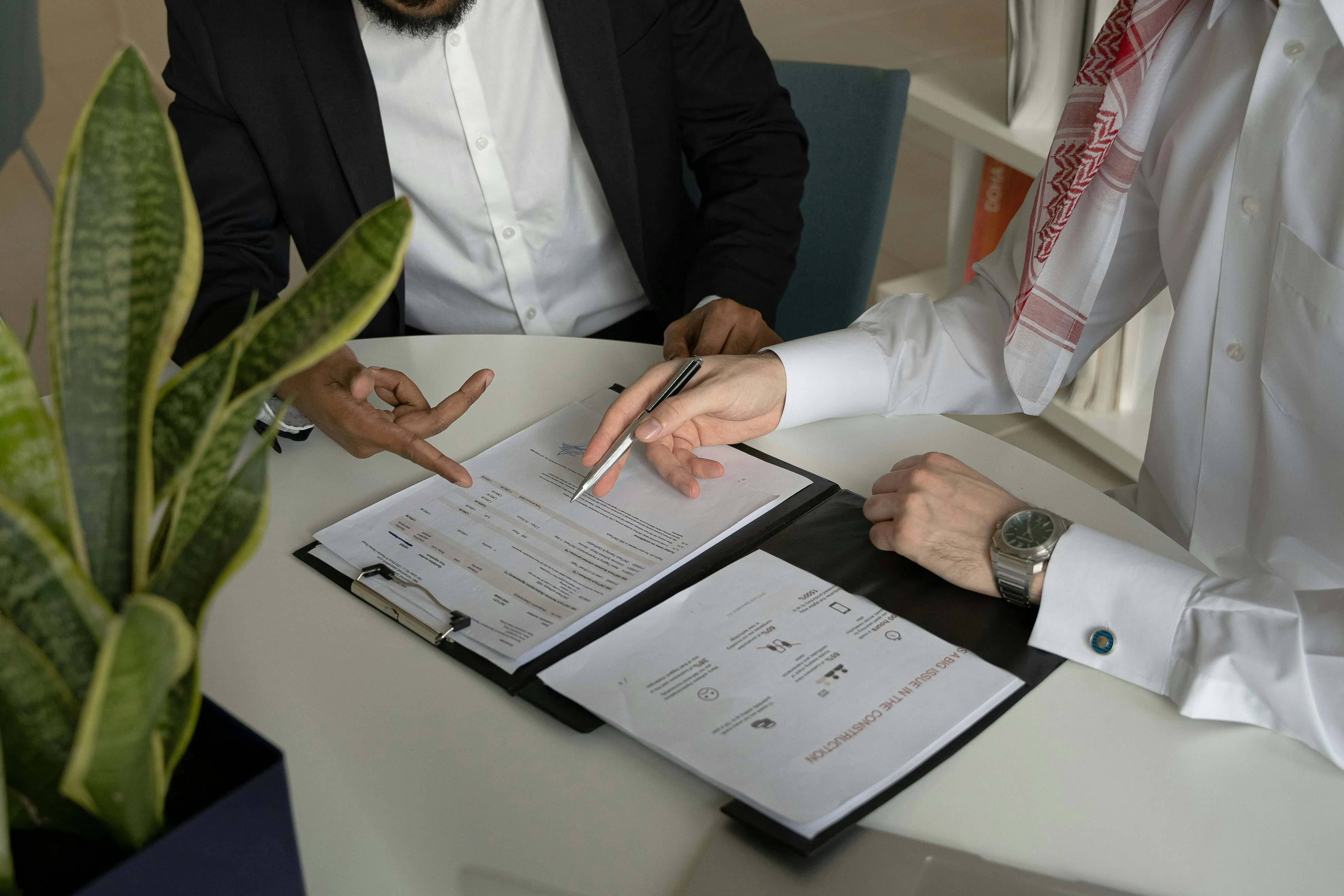 Two people going over documents