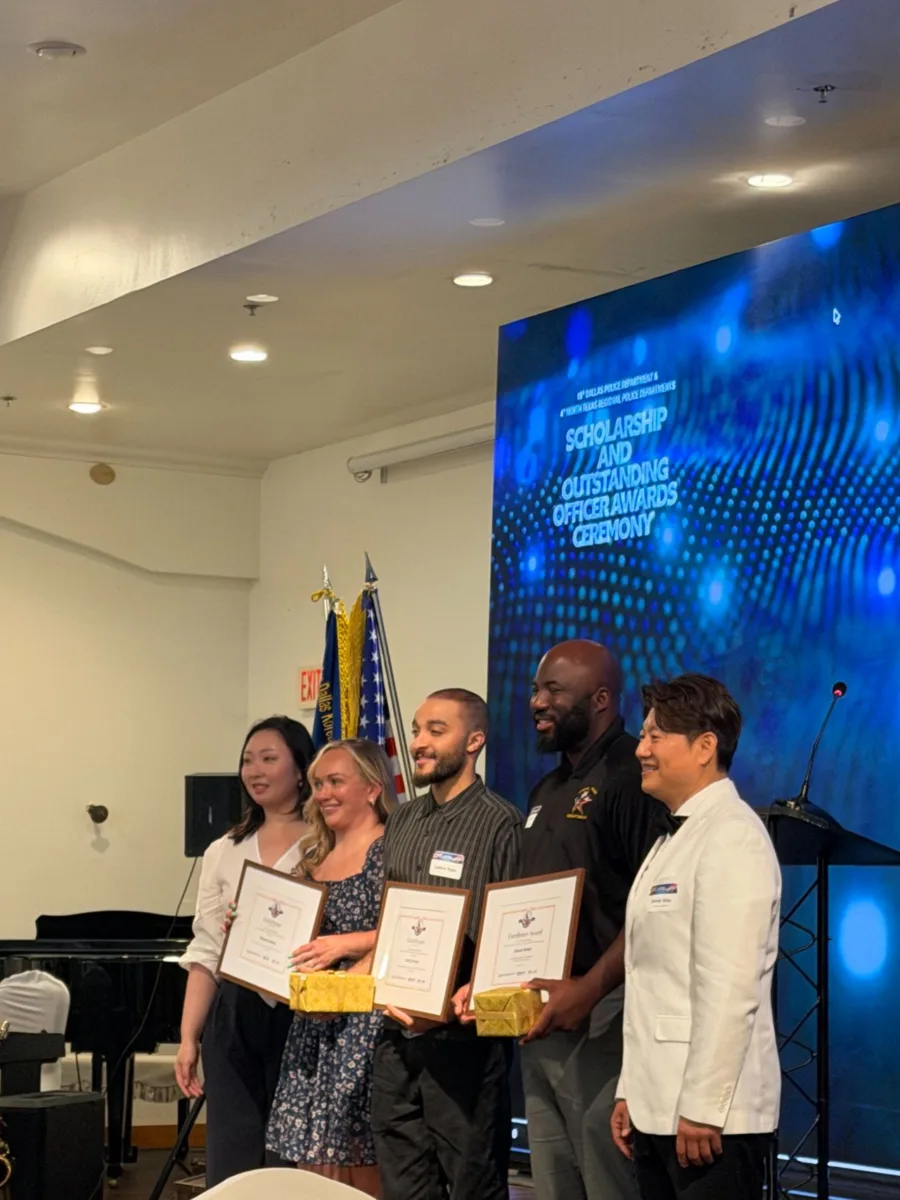Team accepting award at Sul Lee at KACCNT Police Department Appreciation & Scholarship Awards