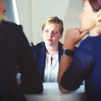 A discussion between three employees