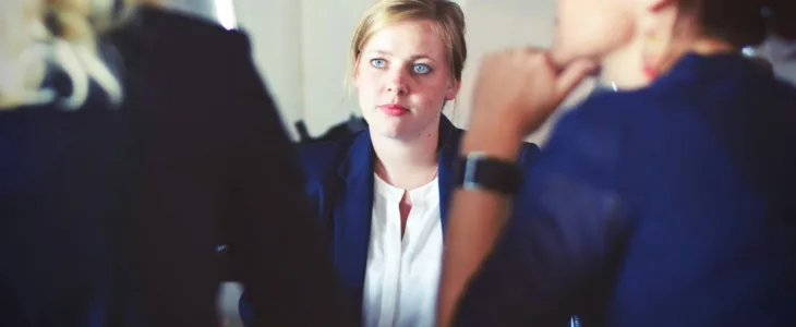 A discussion between three employees
