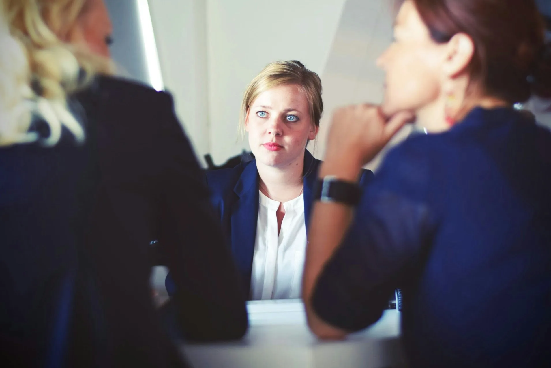 A discussion between three employees
