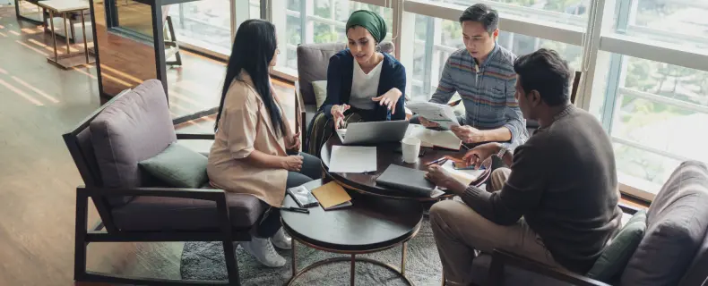 Professionals having a meeting at a coffee table