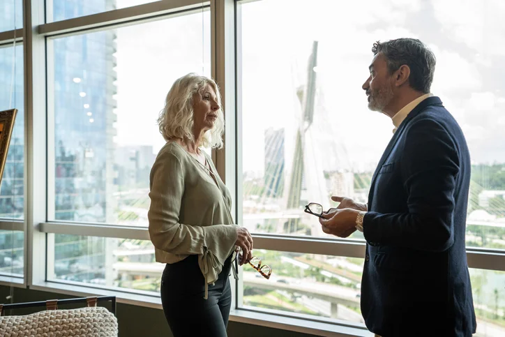 Business partners talking at office